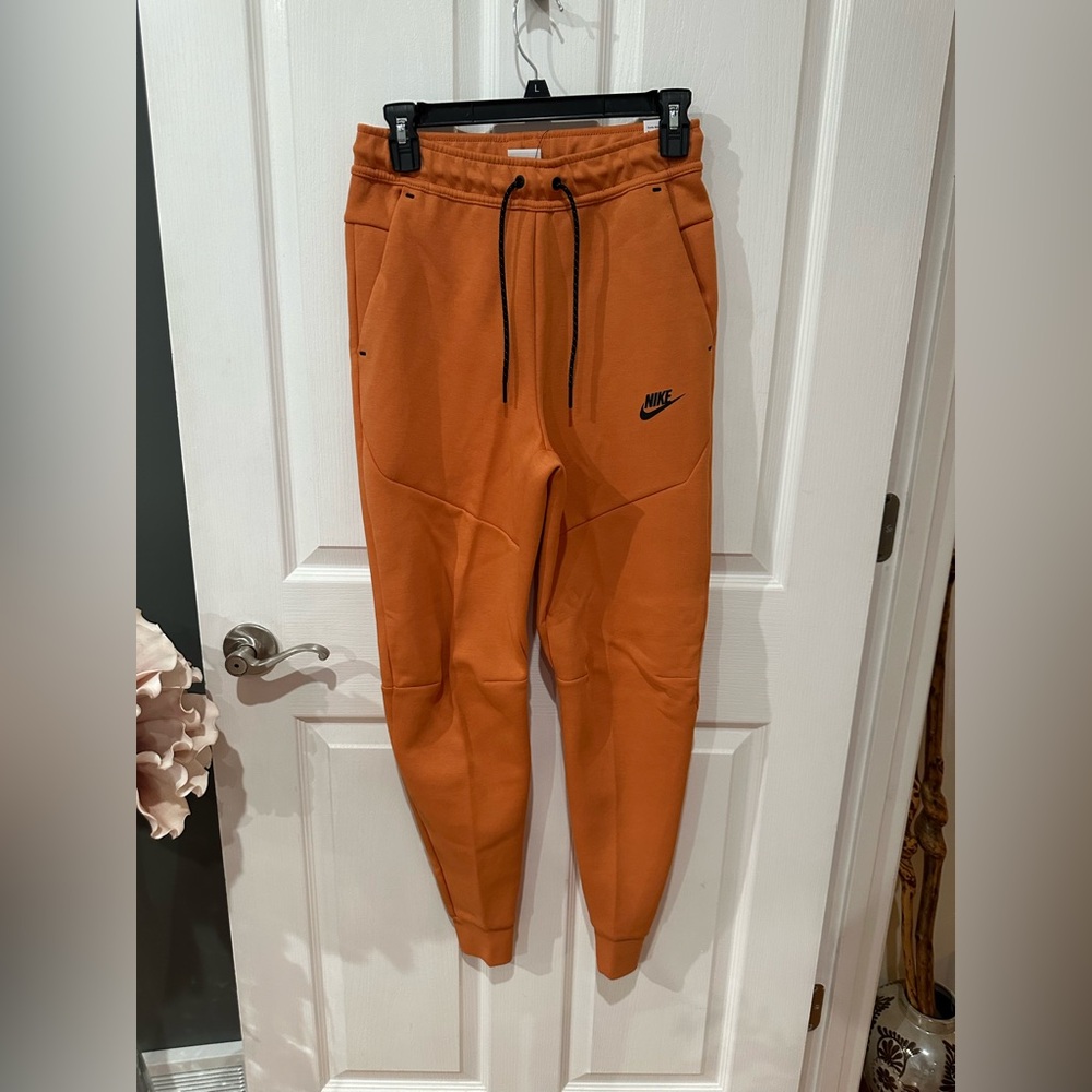 Nike Tech Orange Joggers